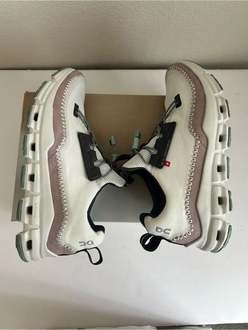 On Running women’s cloudaway Lace-Up Sneakers in White and Light Pink